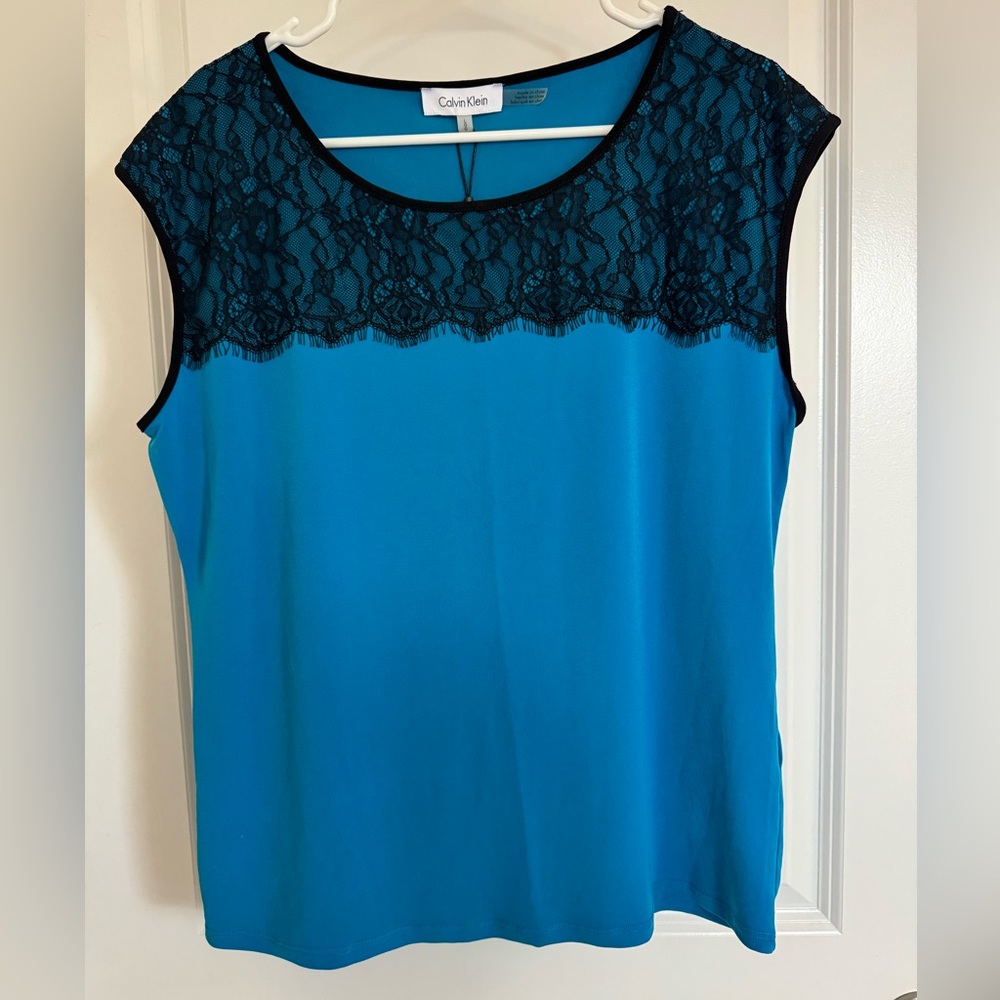 Calvin Klein Large sleeveless work blouse.